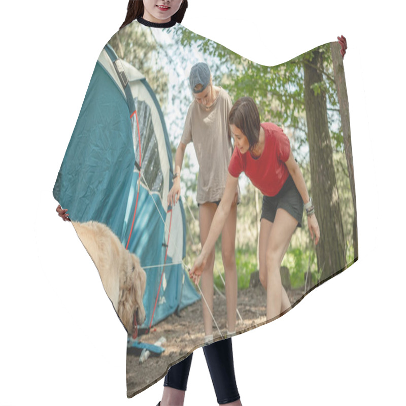 Personality  Mother And Daughter Setting Up A Summer Tent In The Forest With Golden Retriever For A Family Camping Trip Hair Cutting Cape