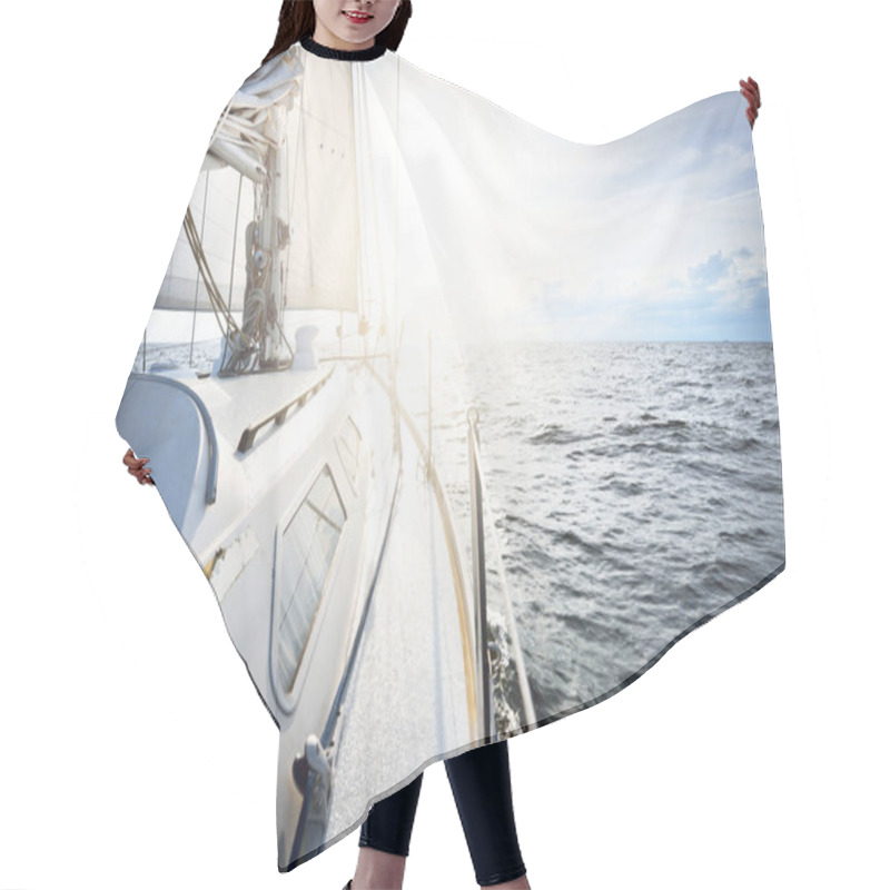 Personality  White Yacht Sailing In An Open Sea At Sunset. Close-up View From The Deck To The Bow And Sails. Dramatic Sky With Colorful Clouds After The Storm. Waves And Water Splashes. Sport And Recreation Theme Hair Cutting Cape