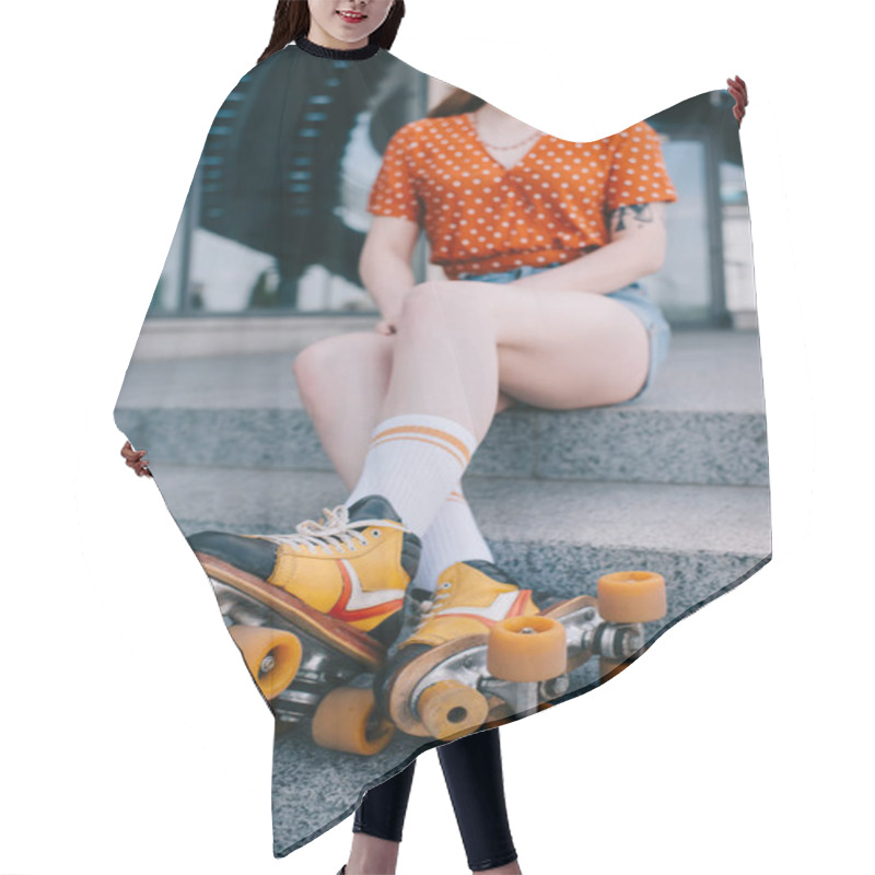 Personality  Cropped Shot Of Girl In Roller Skates Sitting On Stairs Hair Cutting Cape