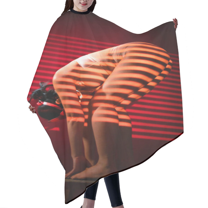 Personality  Portrait Of A Beautiful Young Asian Woman With A Shadow Pattern On The Face And Body In The Form Of Stripes. Bdsm Style. Hair Cutting Cape