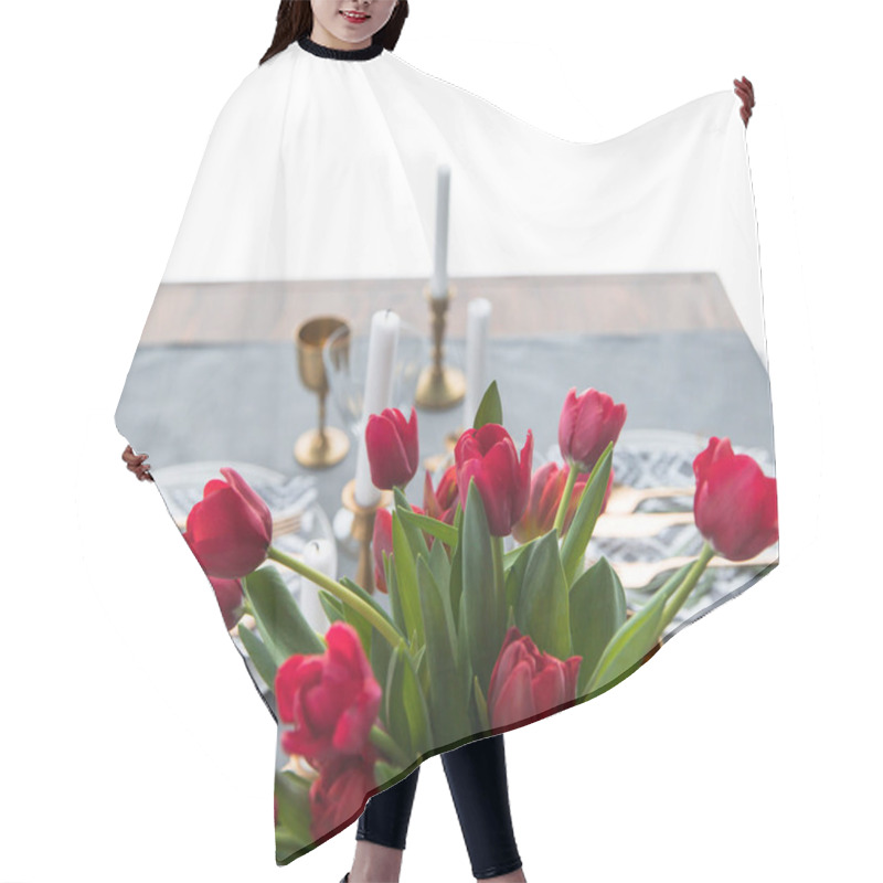 Personality  Selective Focus Of Bouquet Of Red Tulips And Rustic Table Setting Behind Hair Cutting Cape