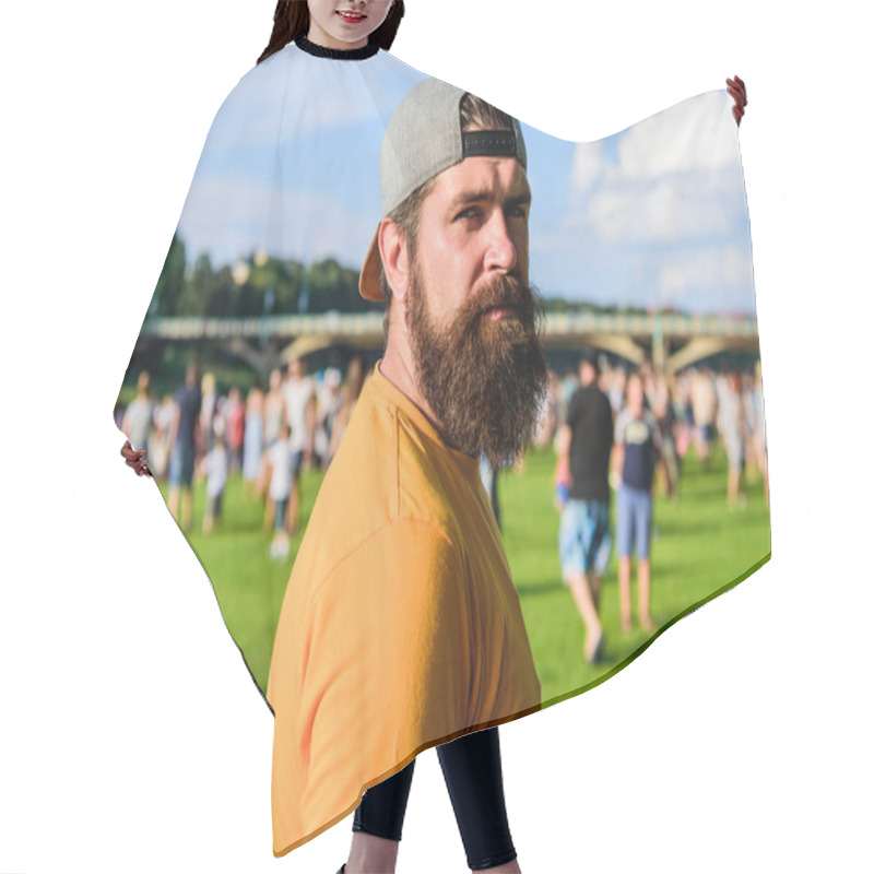 Personality  Visit Summer Festival. Hipster In Cap Happy Celebrate Event Fest Or Festival. Summer Fest. Man Bearded Hipster In Front Of Crowd. Open Air Concert. Fan Zone. Music Festival. Entertainment Concept Hair Cutting Cape