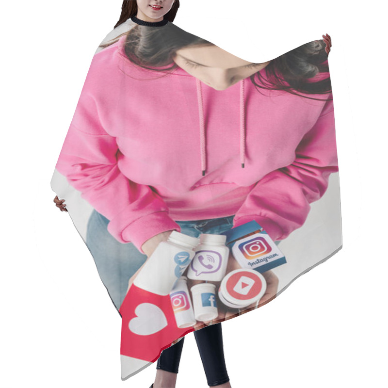 Personality  Overhead View Of Girl Holding Containers With Social Media Logos And Red Paper Cut Card With Heart Symbol On Grey Background Hair Cutting Cape