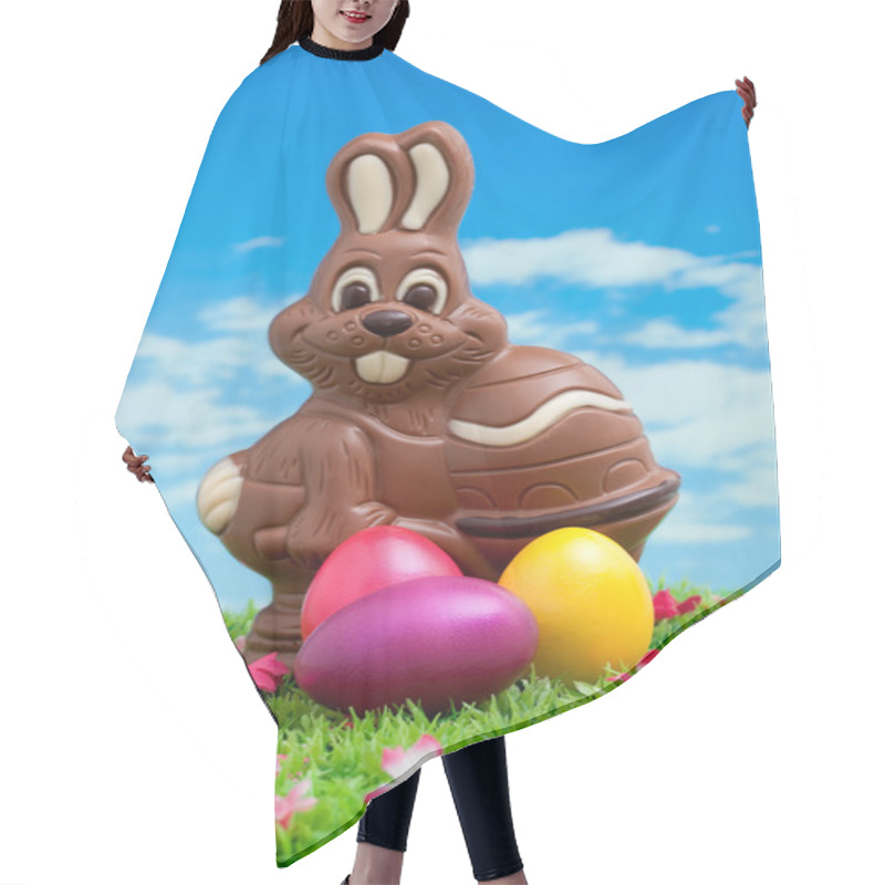 Personality  Easter Bunny Made Of Chocolate With Easter Egg On A Green Meadow With Flowers In Front Of A Blue Sky Hair Cutting Cape