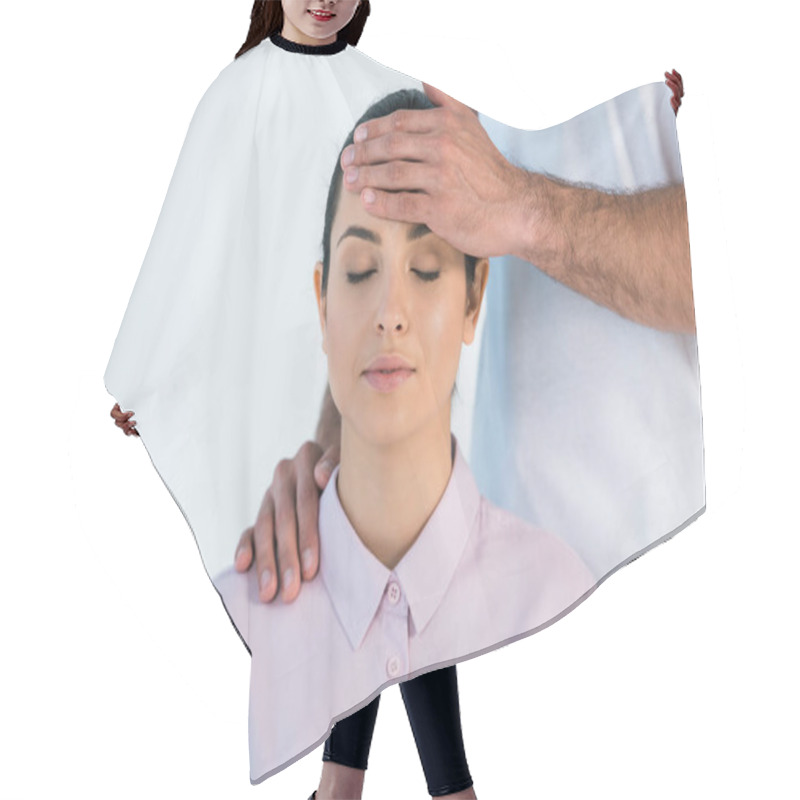 Personality  Cropped View Of Healer Putting Hand On Head Of Attractive Woman With Closed Eyes Isolated On White  Hair Cutting Cape