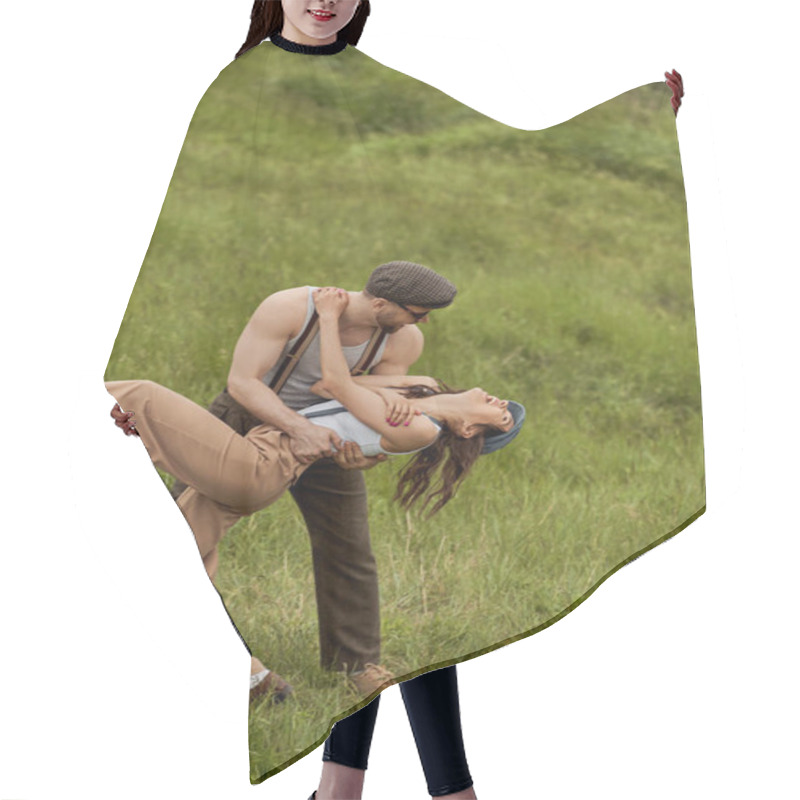 Personality  Stylish Bearded Man In Sunglasses Hugging And Having Fun With Cheerful Brunette Girlfriend In Vintage Outfit And Newsboy Cap And Standing On Grassy Meadow, Stylish Pair Amidst Nature Hair Cutting Cape