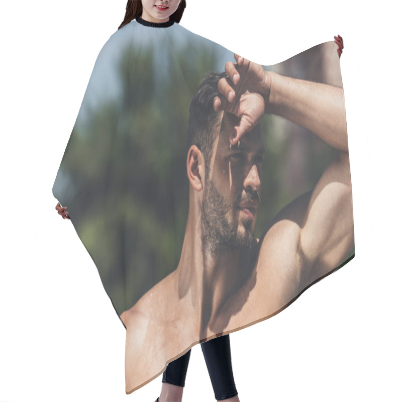 Personality  Close-up Portrait Of Shirtless Young Man Standing On Race Track After Workout And Wiping Forehead Hair Cutting Cape