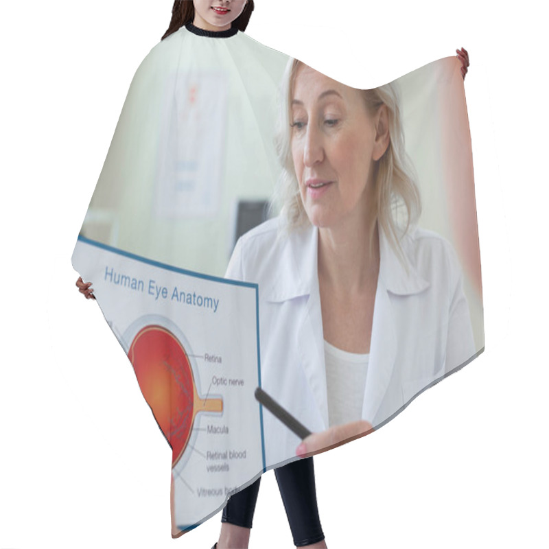 Personality  Attentive Short-haired Doctor Pointing On Scheme With Eye Anatomy Hair Cutting Cape