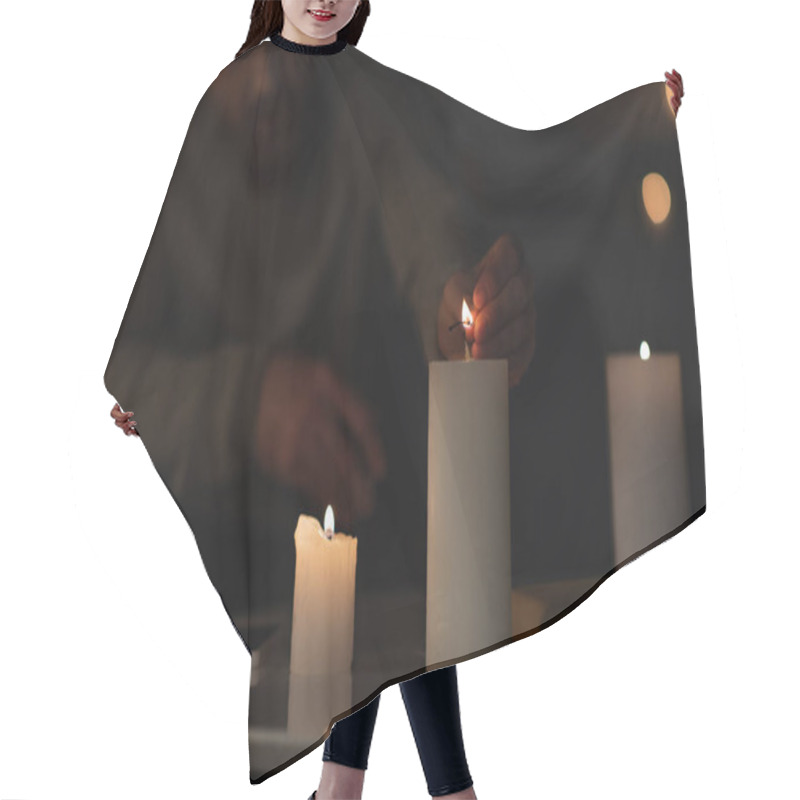 Personality  Partial View Of Man In Darkness Lighting Candle Near Book And Smartphone On Table  Hair Cutting Cape