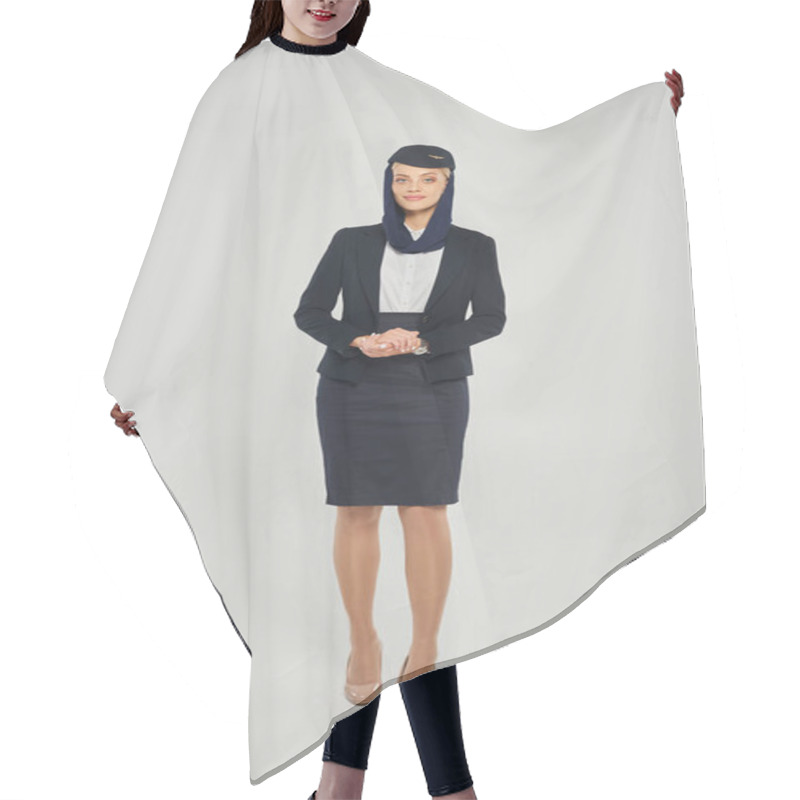 Personality  Full Length Of Young Woman In Elegant Uniform Of Arabian Airlines Stewardess On Grey Backdrop Hair Cutting Cape