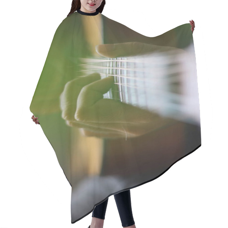 Personality  Hrough The Cut-outs Of A Monstera Leaf, Hands Can Be Seen Playing Chords And Melodies On The Neck Of An Acoustic Guitar Hair Cutting Cape