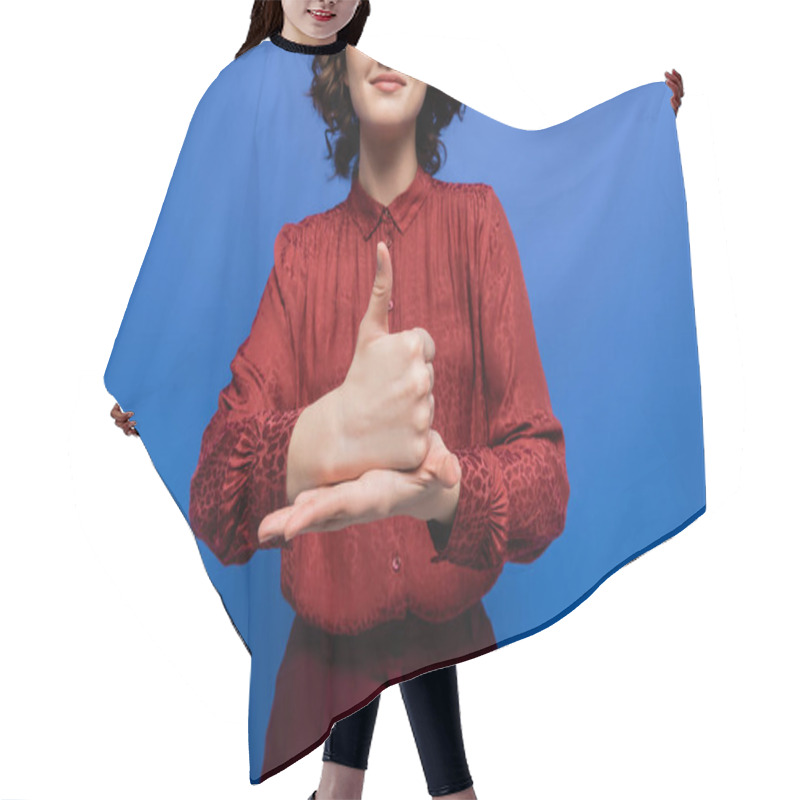 Personality  Partial View Of Positive Woman In Burgundy Blouse Showing Gesture Meaning Help On Sign Language Isolated On Blue Hair Cutting Cape