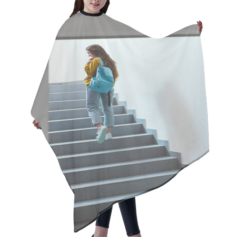 Personality  Rear View Of Schoolgirl With Backpack Walking Upstairs Hair Cutting Cape