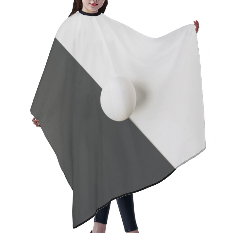 Personality  White Egg Laying In Middle Of Black And White Background  Hair Cutting Cape