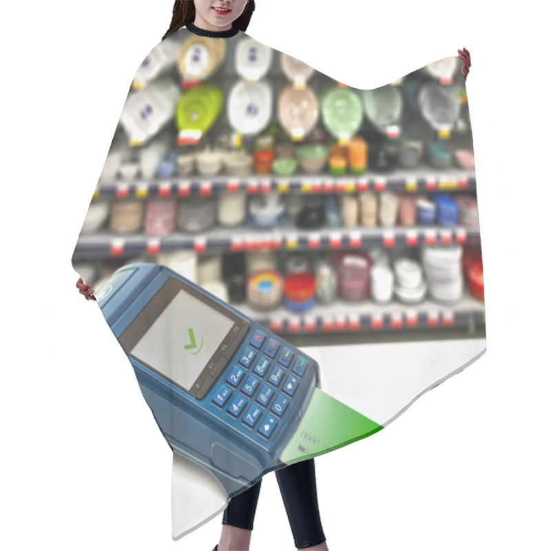 Personality  Payment Of Purchases By Card With The Payment Terminal In The Store Of Tablewares. Hair Cutting Cape