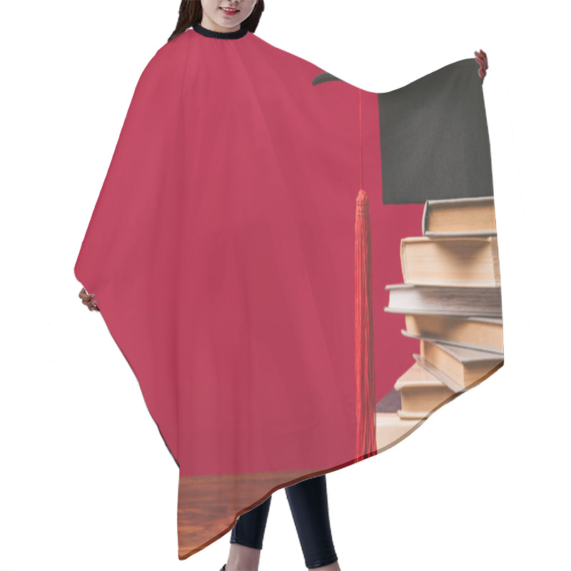 Personality  Cropped View Of Stack Of Books With Academic Cap On Red Hair Cutting Cape