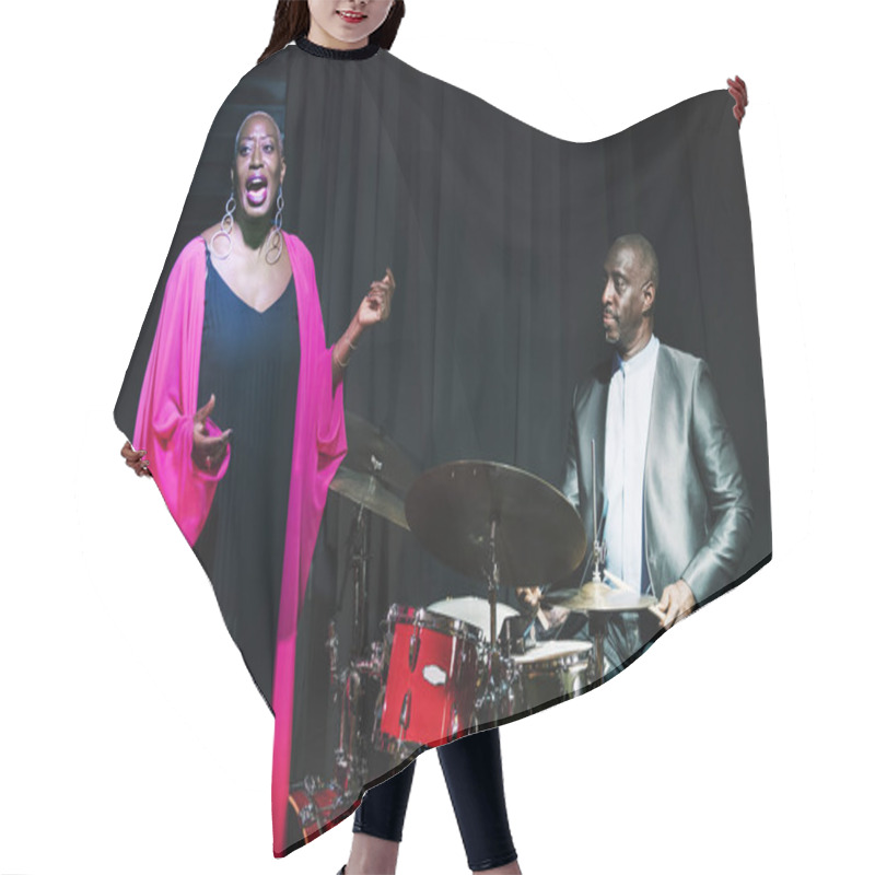 Personality  Drummer And Singer Performing In An Event Hair Cutting Cape