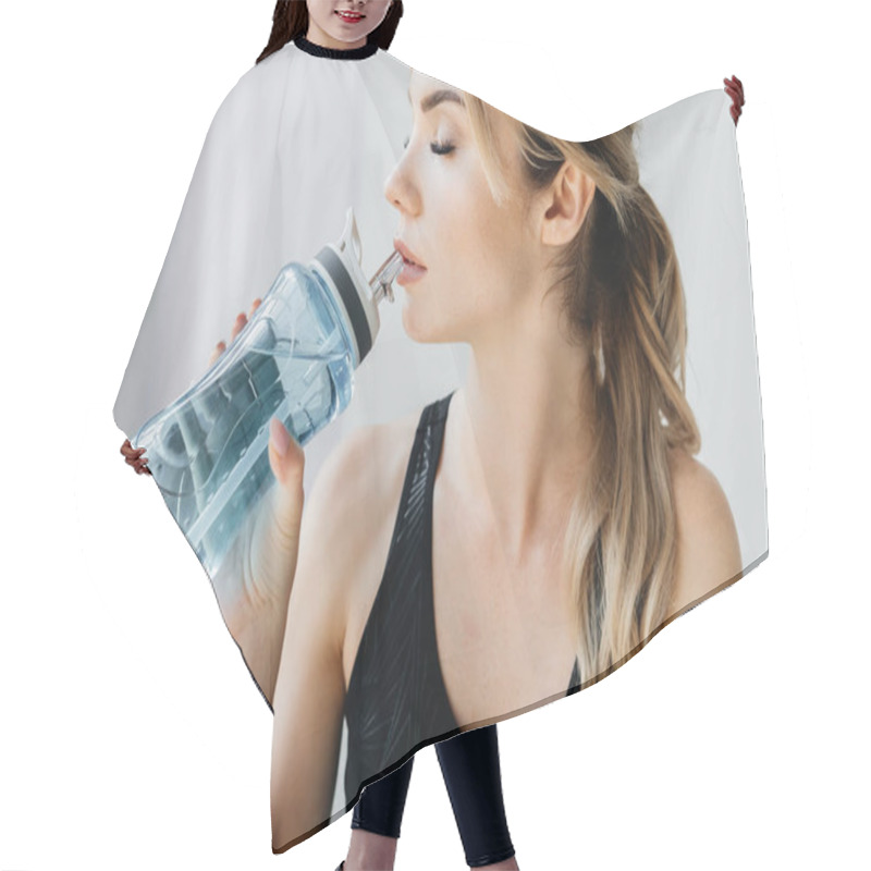 Personality  Side View Of Athletic Woman Drinking Water From Sportive Water Bottle On Grey Backdrop Hair Cutting Cape