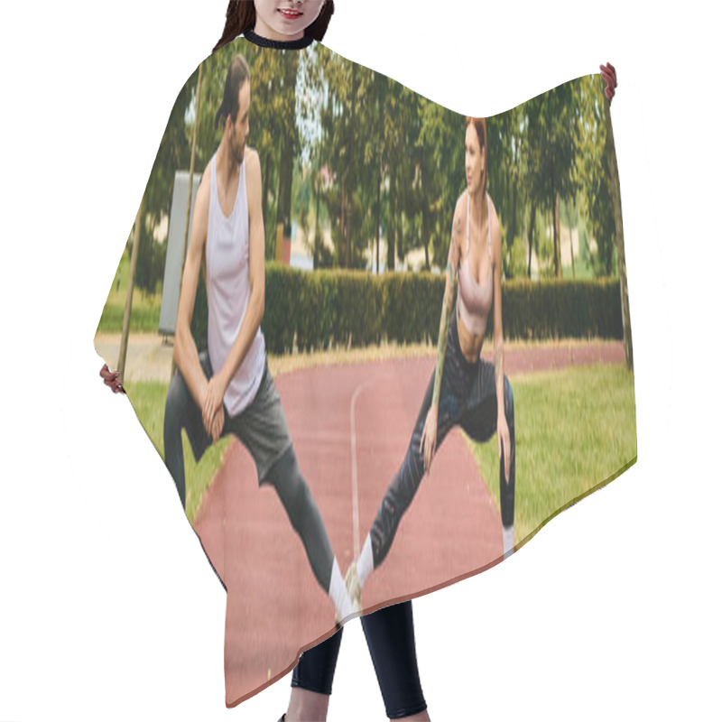 Personality  A Woman In Sportswear, Guided By Their Personal Trainer, Display Determination And Motivation While Practicing Outdoors In A Serene Park Setting. Hair Cutting Cape