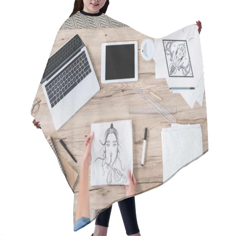 Personality  Cropped Image Of Female Designer Putting White T-shirt With Print On Table With Digital Devices An Paintings  Hair Cutting Cape