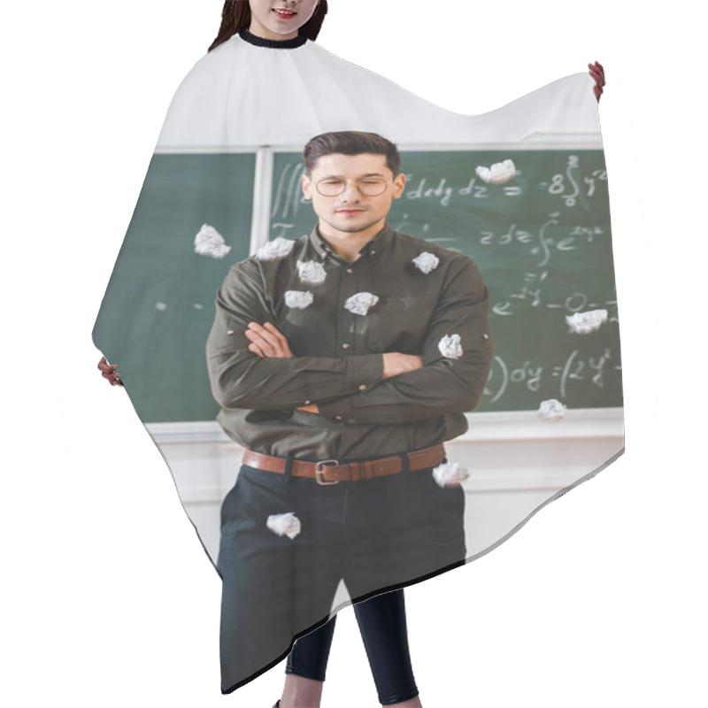 Personality  Crumpled Paper Balls Flying At Male Teacher With Arms Crossed In Classroom With Chalkboard On Background Hair Cutting Cape