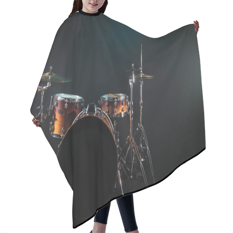 Personality  Drum Set On A Black Background With A Beautiful Soft Light Hair Cutting Cape