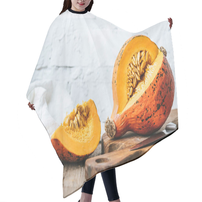 Personality  Close Up View Of Cut Pumpkin On Cutting Board On Wooden Surface And White Brick Wall Background Hair Cutting Cape