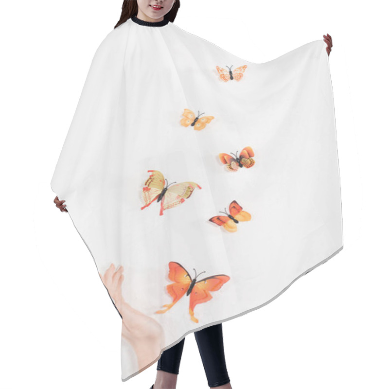 Personality  Cropped View Of Female Hand Near Butterflies Flying On White Background, Environmental Saving Concept  Hair Cutting Cape