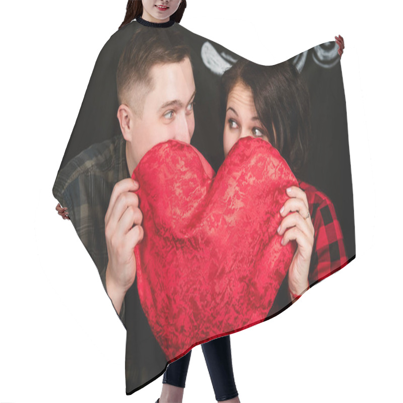 Personality  Young Cheerful European Couple In Love Embracing And Kissing, In Decorated With Hearts Studio On Valentine Day, Dating. Hair Cutting Cape