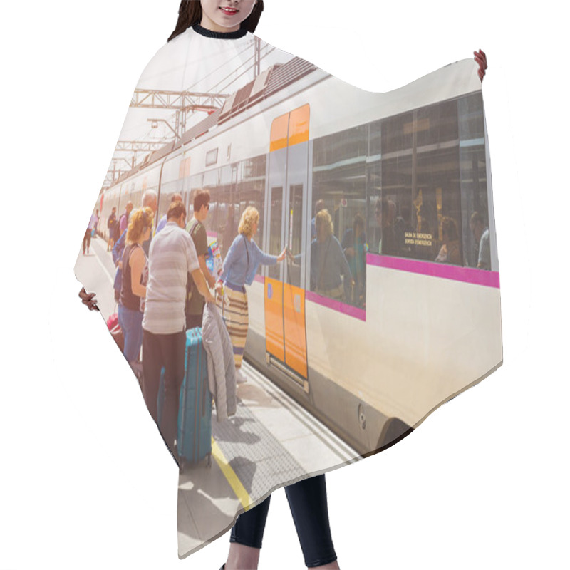 Personality  BARCELONA, SPAIN - APRIL 27, 2018: Passengers Board The Renfe Train At El Prat Airport At The Station Hair Cutting Cape