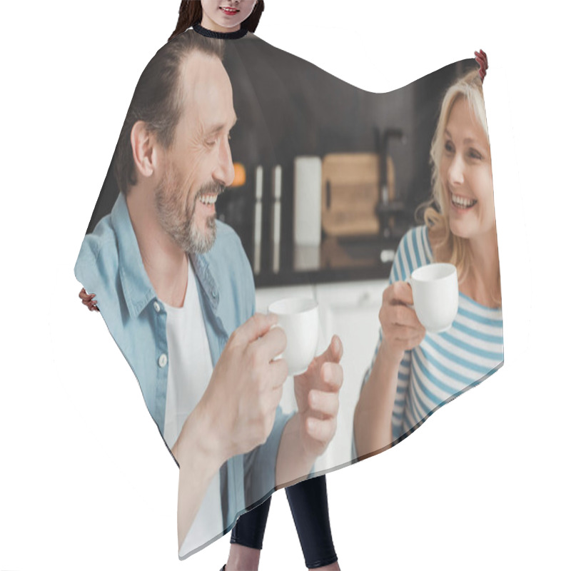 Personality  Beautiful Smiling Woman Holding Cup Of Coffee Near Husband In Kitchen  Hair Cutting Cape