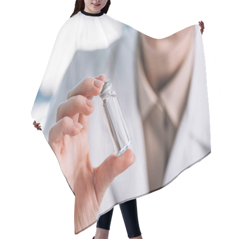 Personality  Close Up Of Immunologist Holding Glass Bottle In Clinic  Hair Cutting Cape