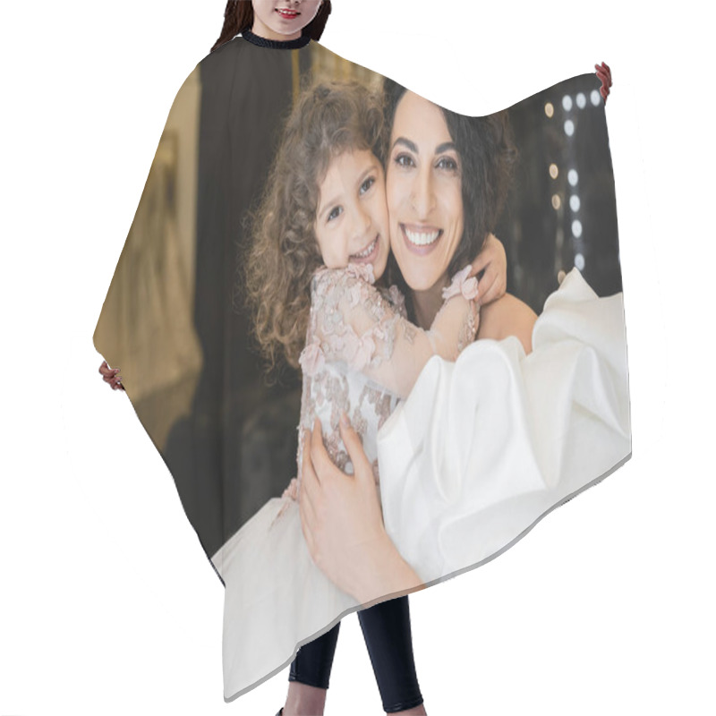 Personality  Happy Little Girl In Floral Attire Hugging Tight Her Charming Mother In White Wedding Dress With Puff Sleeves And Ruffles While Smiling And Looking At Camera Together In Bridal Boutique  Hair Cutting Cape