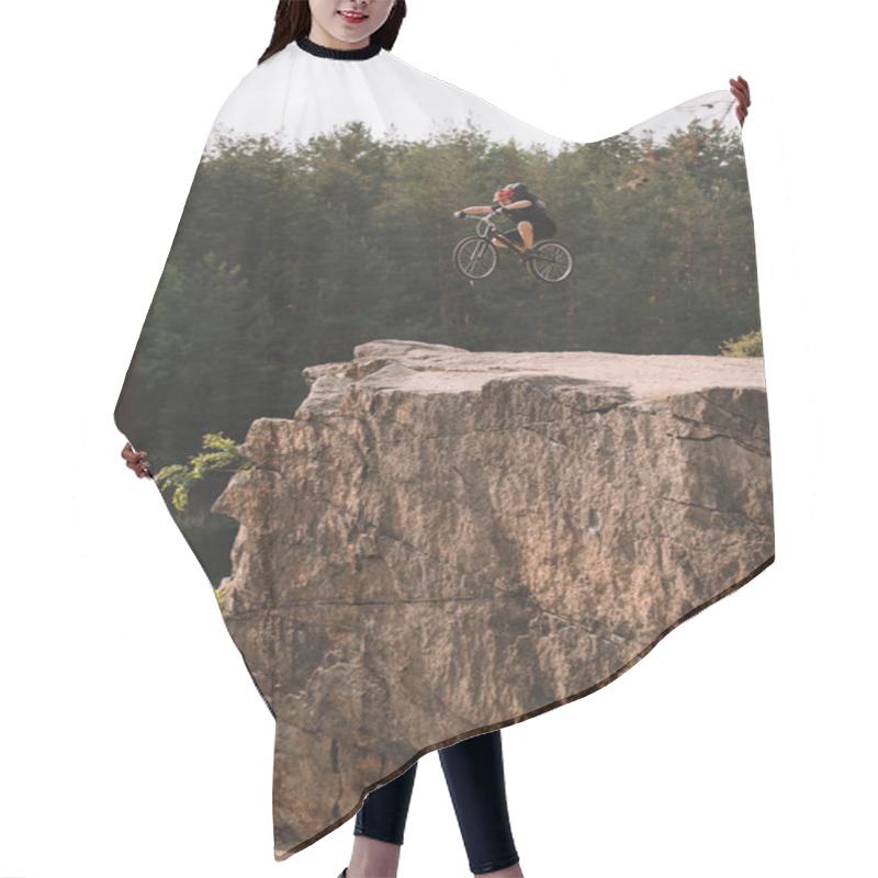 Personality  Trial Biker Jumping On Bicycle Over Rocky Cliff Outdoors In Forest Hair Cutting Cape