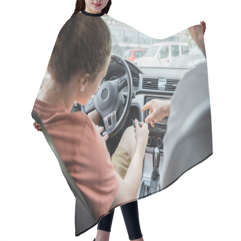 Personality  Back View Of Father Pointing With Finger While Showing Teenage Son How To Start Car  Hair Cutting Cape