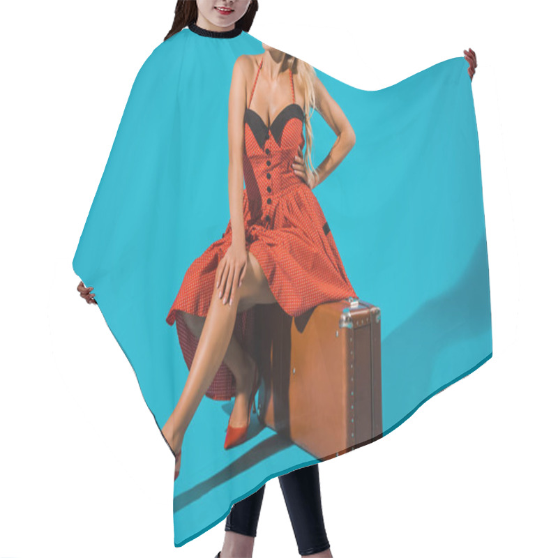 Personality  Cropped Shot Of Woman In Retro Dress Sitting On Suitcase On Blue Backdrop Hair Cutting Cape