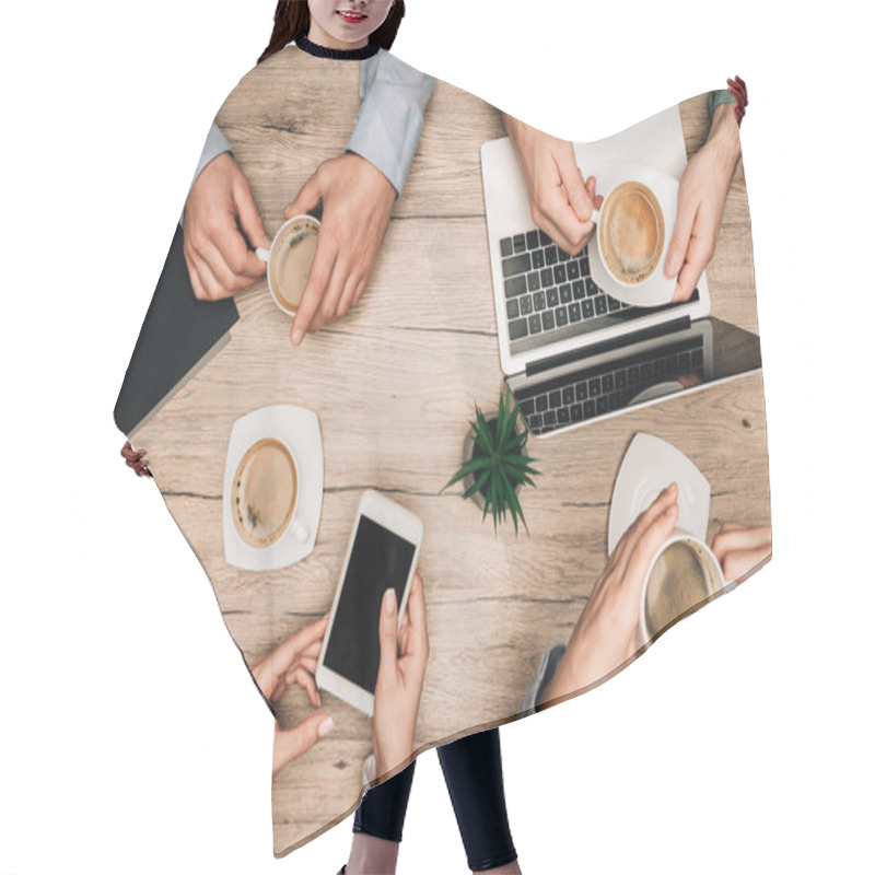 Personality  Top View Of Business Partners Drinking Coffee By Gadgets On Table, Cropped View Hair Cutting Cape