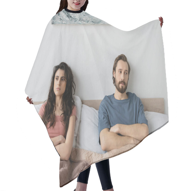 Personality  Couple With Relationship Difficulties Crossing Arms While Sitting On Bed At Home  Hair Cutting Cape