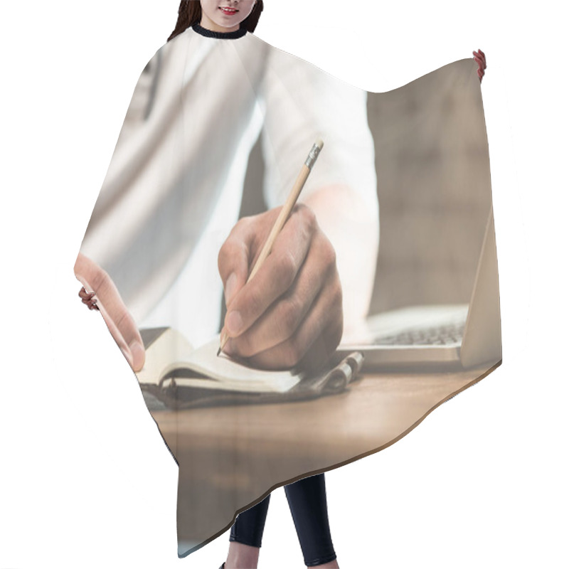 Personality  Partial View Of Man Making Notes In Textbook At Table With Laptop Hair Cutting Cape