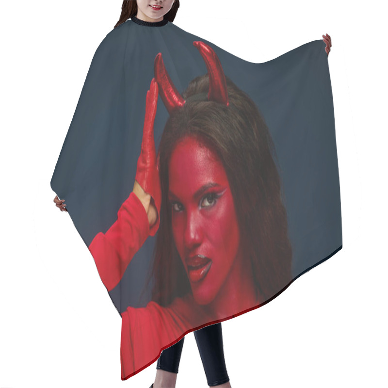 Personality  Dressed In Vibrant Red, A Captivating Woman Playfully Poses, Embodying Halloween Spirit. Hair Cutting Cape