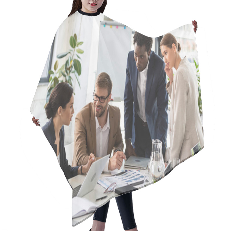 Personality  Multiethnic Businesspeople At Table During Conference In Office Hair Cutting Cape