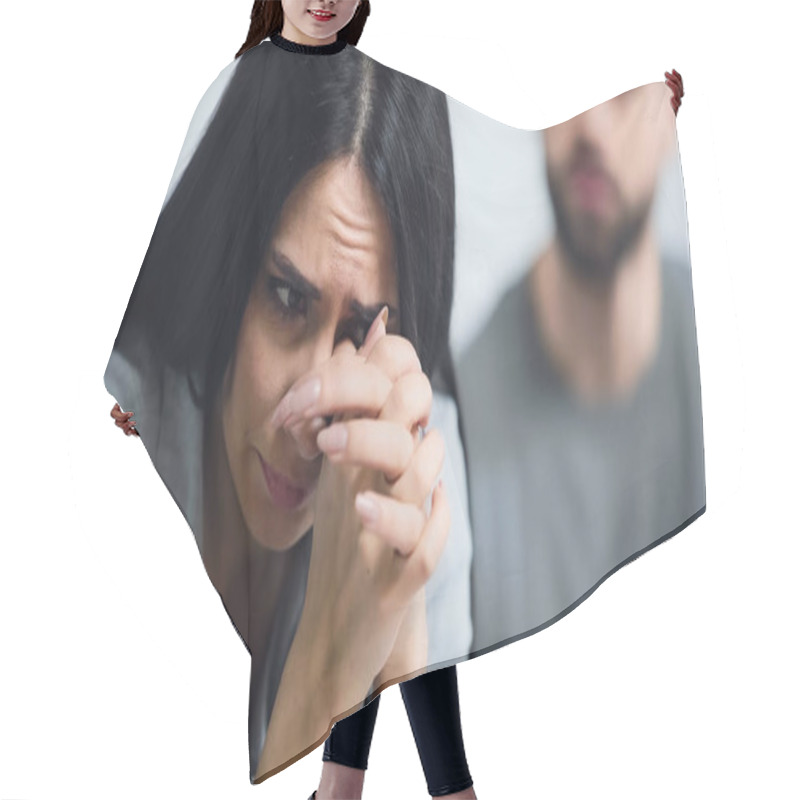 Personality  Sad Woman With Clenched Hands Covering Face While Crying Near Blurred Man  Hair Cutting Cape