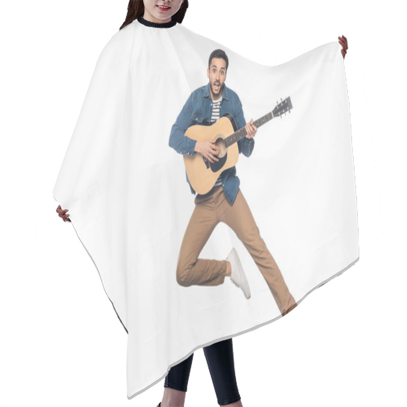 Personality  Happy Man Levitating While Playing Acoustic Guitar On White Hair Cutting Cape