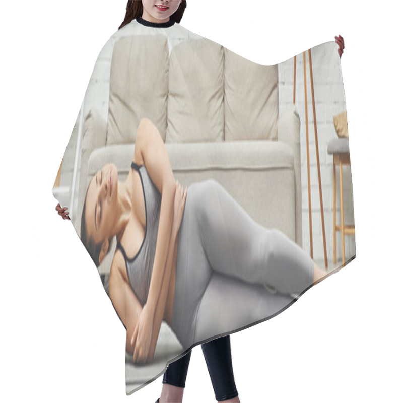 Personality  Peaceful Young Woman With Closed Eyes Massaging Shoulder With Roller Massager And Lying On Fitness Mat In Living Room At Home, Sense Of Tranquility And Promote Relaxation Concept, Banner  Hair Cutting Cape