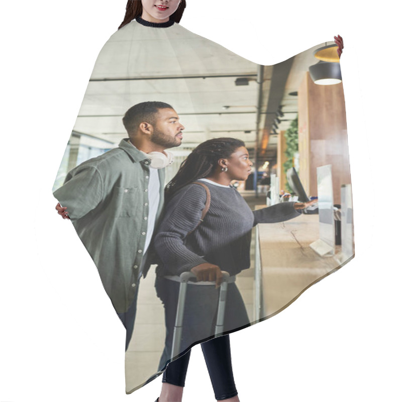 Personality  A Young African American Couple Eagerly Checks In At A Hotel Lobby, Ready To Begin Their Vacation Adventure. Hair Cutting Cape