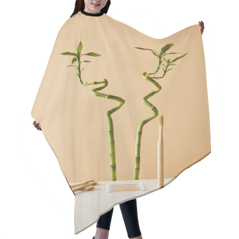 Personality  Bamboo Toothbrush With Ear Sticks On White Table And Green Bamboo On Beige Background Hair Cutting Cape