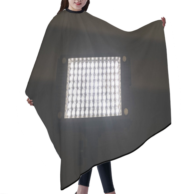 Personality  Bright Powerful Light Of A Rectangular Lantern With LEDs. A Bright Rectangle On A Black Background Hair Cutting Cape