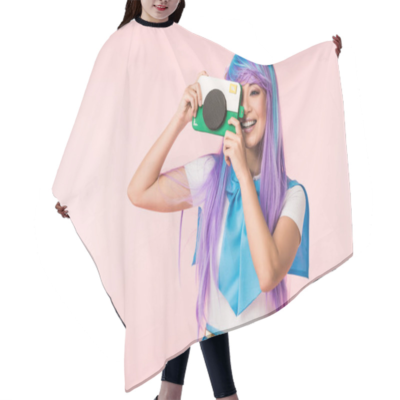 Personality  Smiling Asian Anime Girl In Purple Wig Holding Cardboard Camera Isolated On Pink Hair Cutting Cape