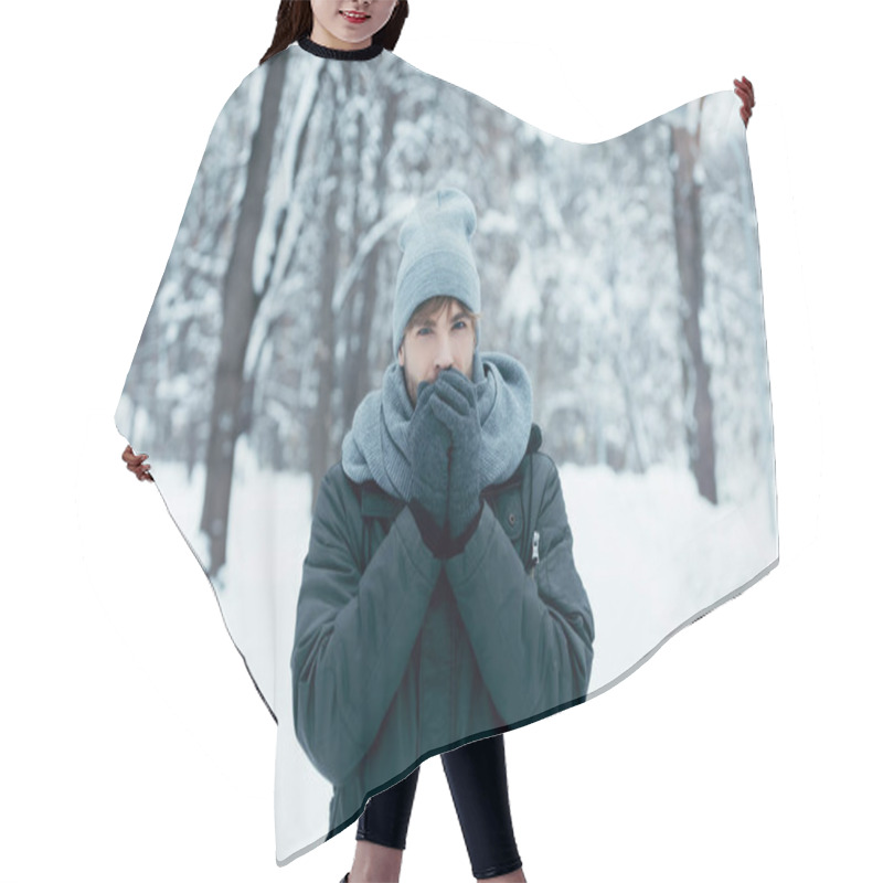 Personality  Portrait Of Young Man Warming Hands Up While Walking In Snowy Park Hair Cutting Cape