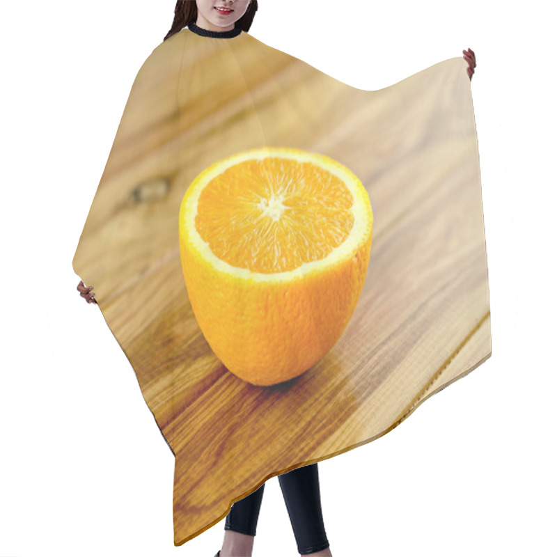 Personality  Juicy Cut Orange On Wooden Background Hair Cutting Cape